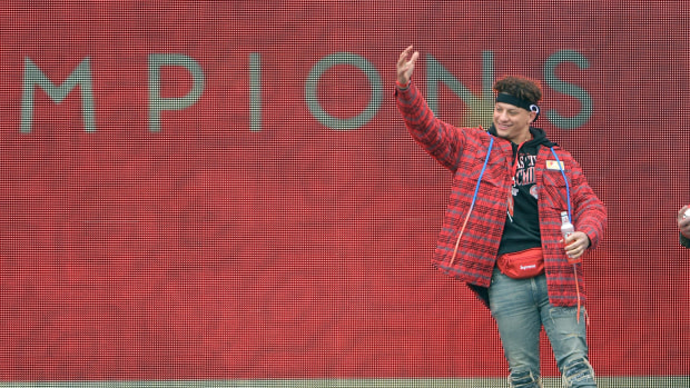 Feb 5, 2020; Kansas City, Missouri, USA; Kansas City Chiefs quarterback Patrick Mahomes (15) waves to the fans on stage during the rally. Mandatory Credit: Denny Medley-USA TODAY Sports